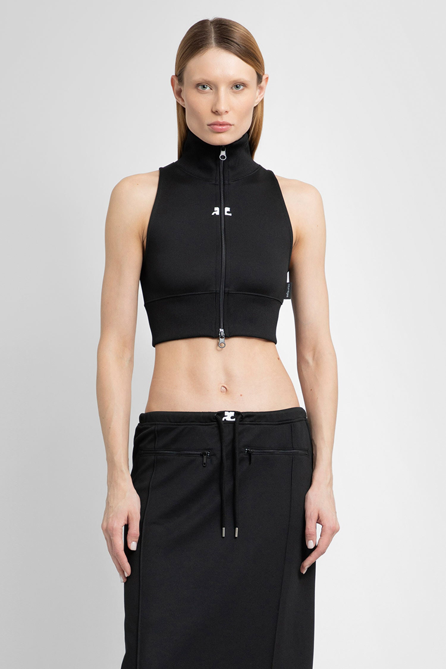 COURRÈGES WOMAN BLACK TOPS