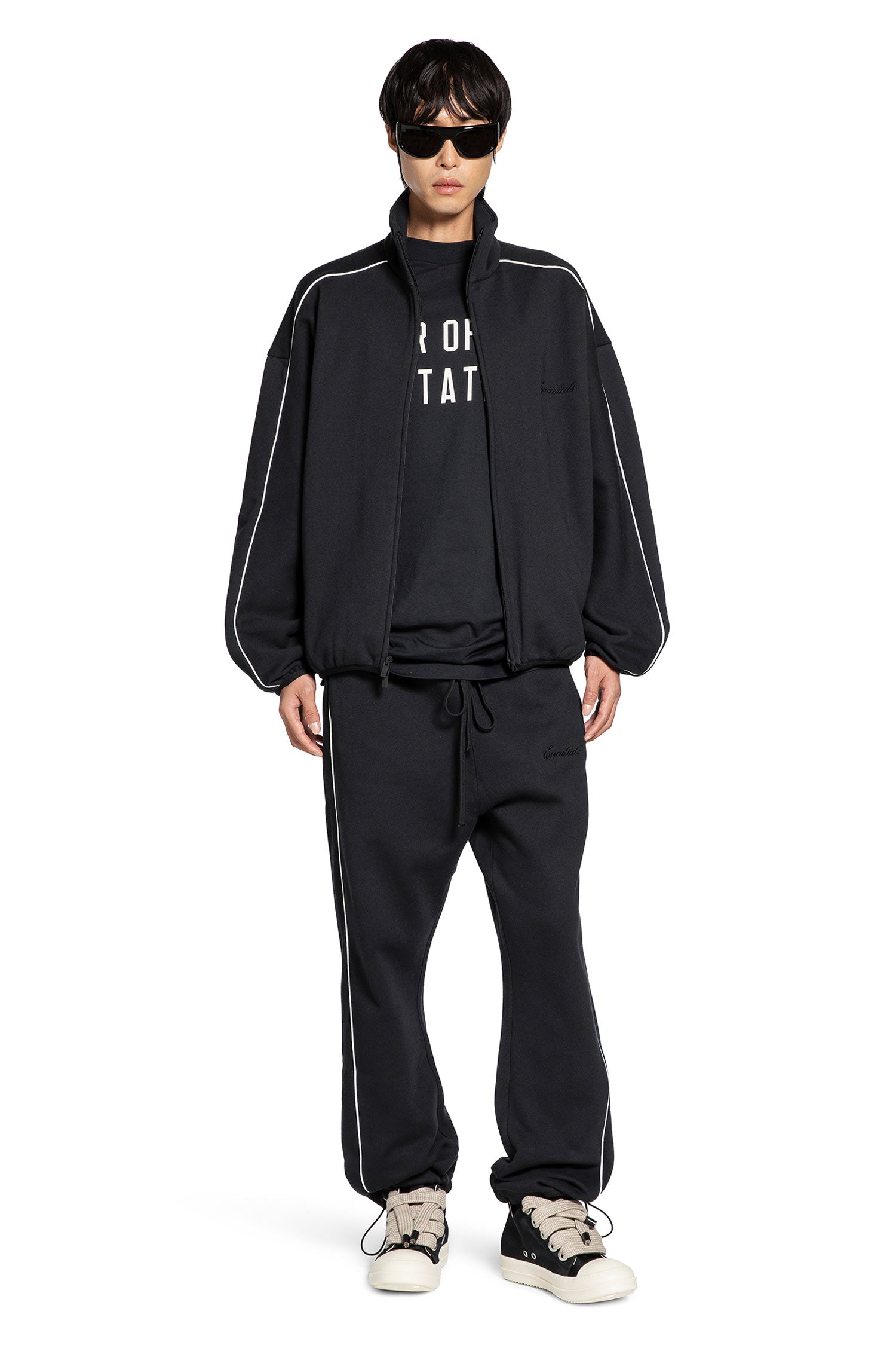 Pantaloni da tuta in pile rilassati con bordatura