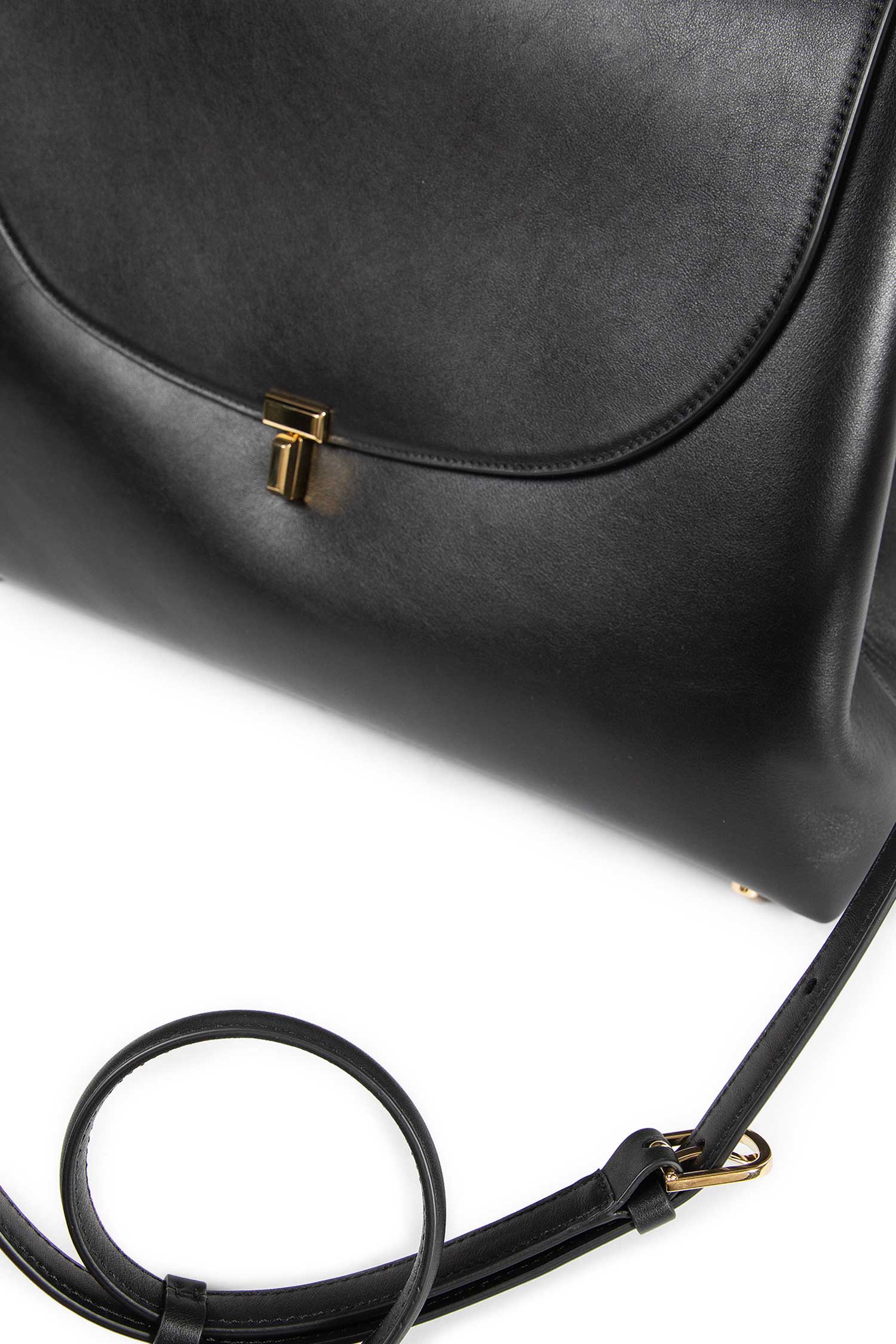 T Lock Satchel Clutch in Leather