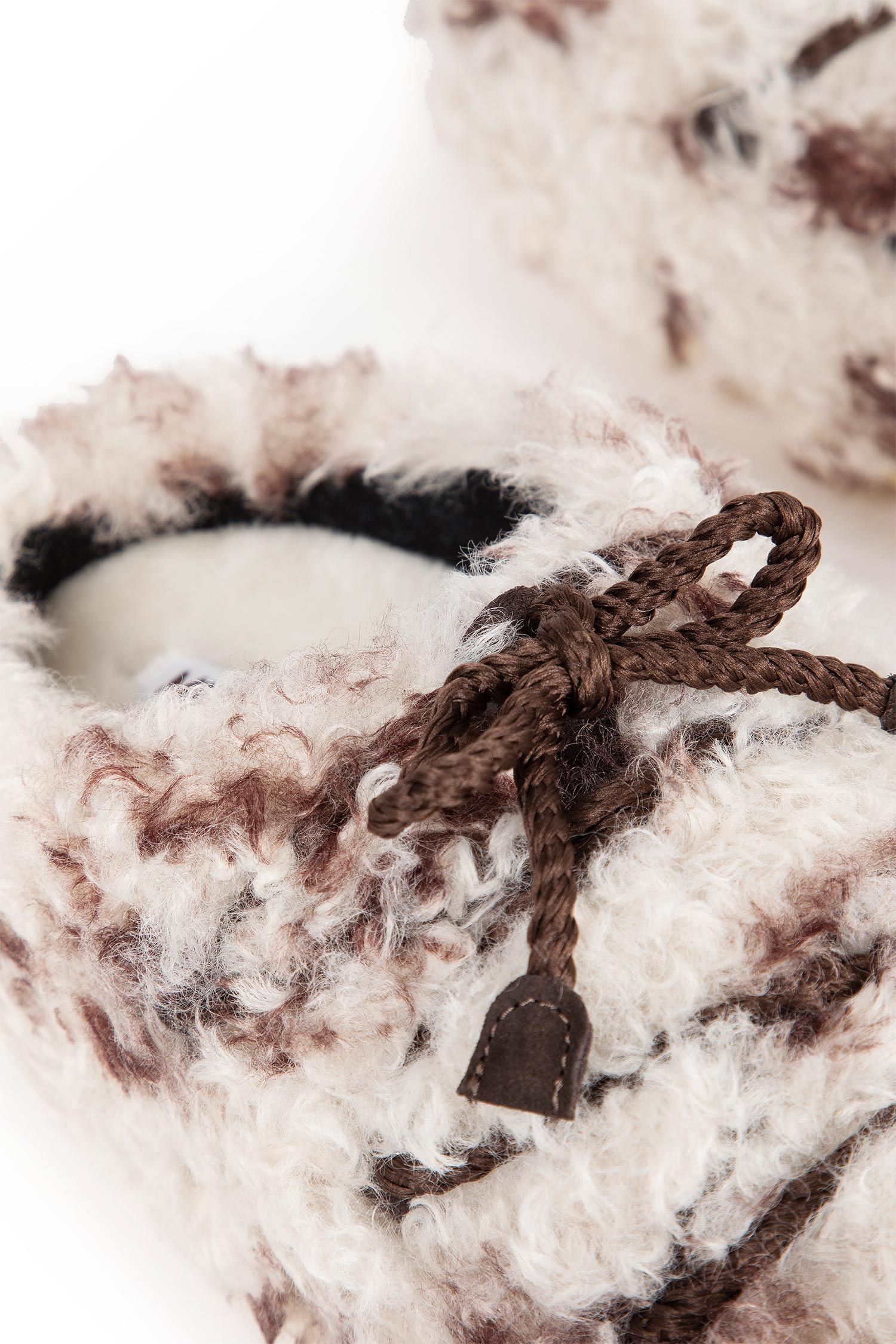 EVX Cow Print Curly Mules