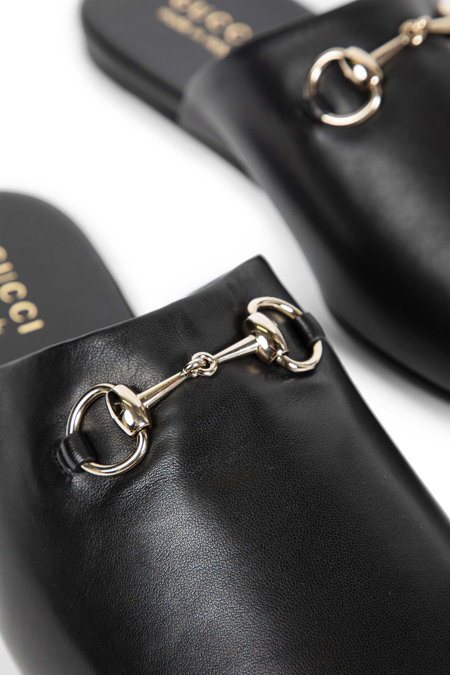 GUCCI MAN BLACK SANDALS & SLIDES