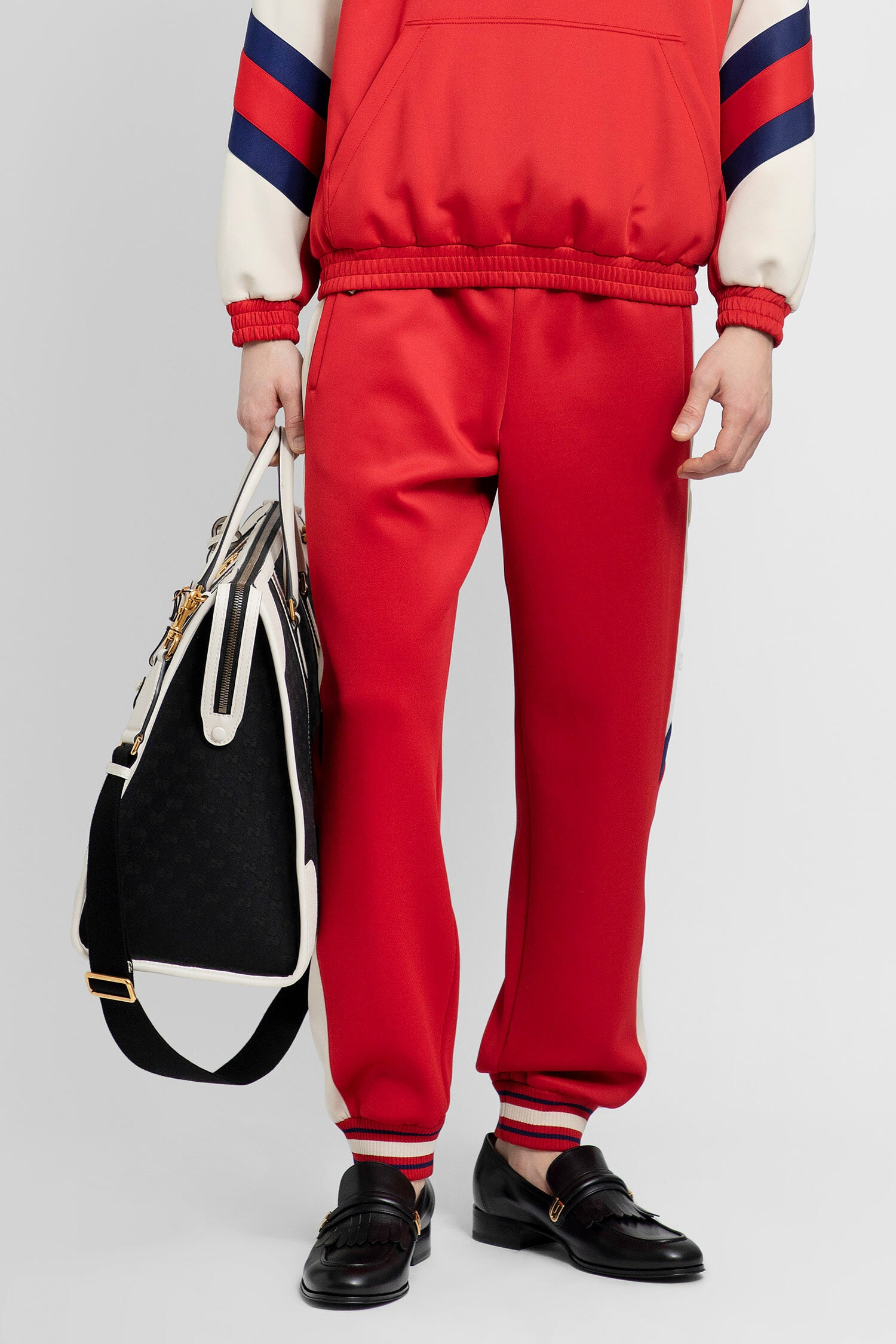 Gucci hotsell red trousers