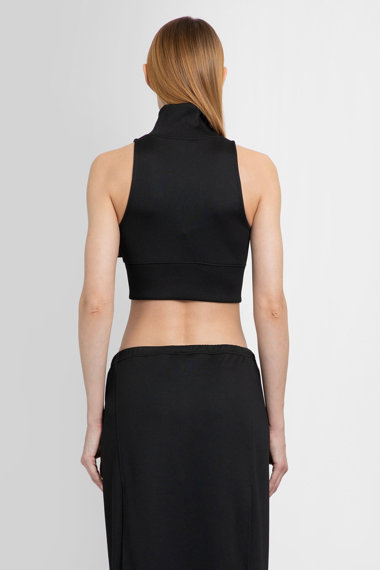 COURRÈGES WOMAN BLACK TOPS