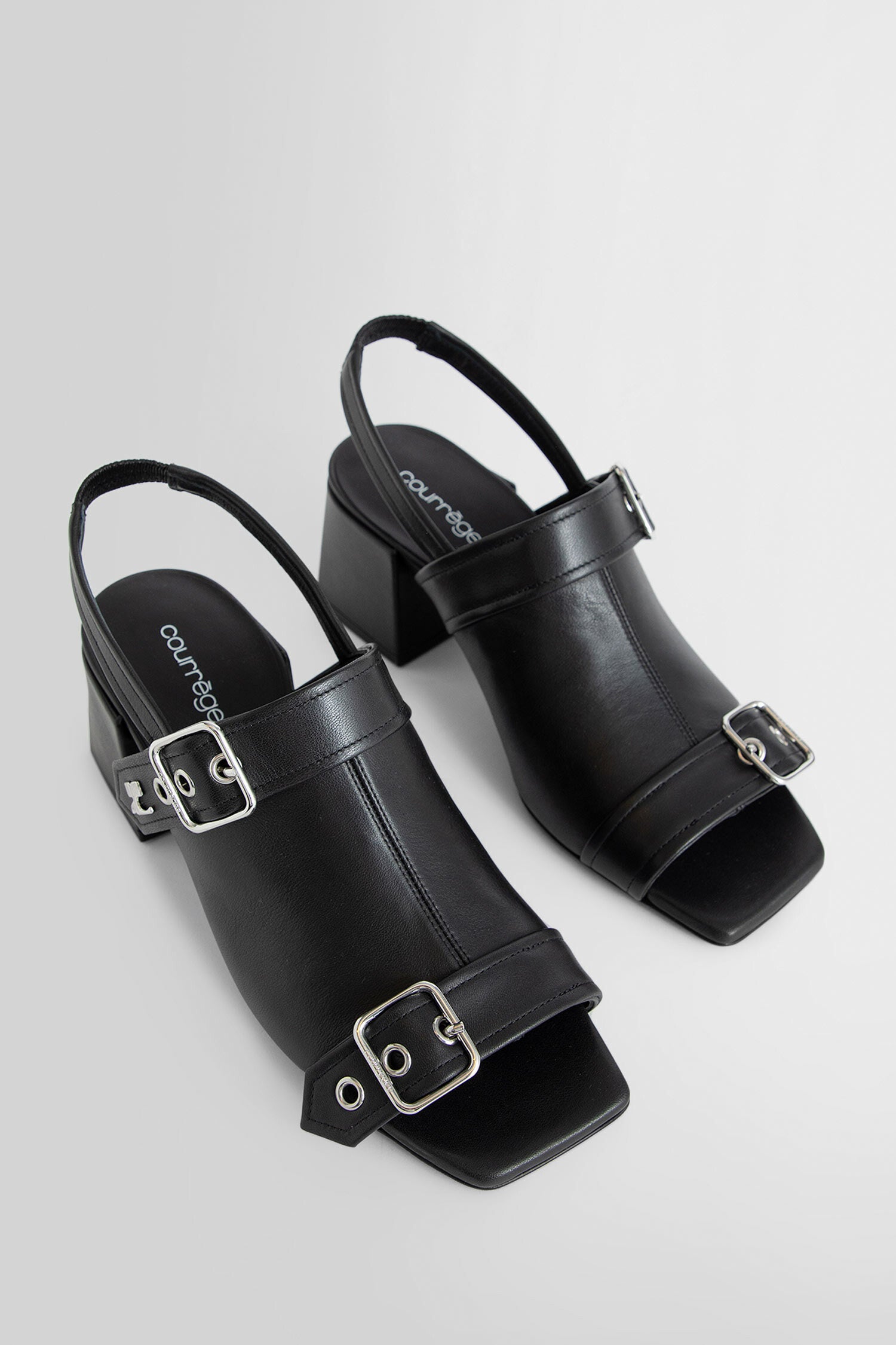 COURRÈGES WOMAN BLACK SANDALS & SLIDES