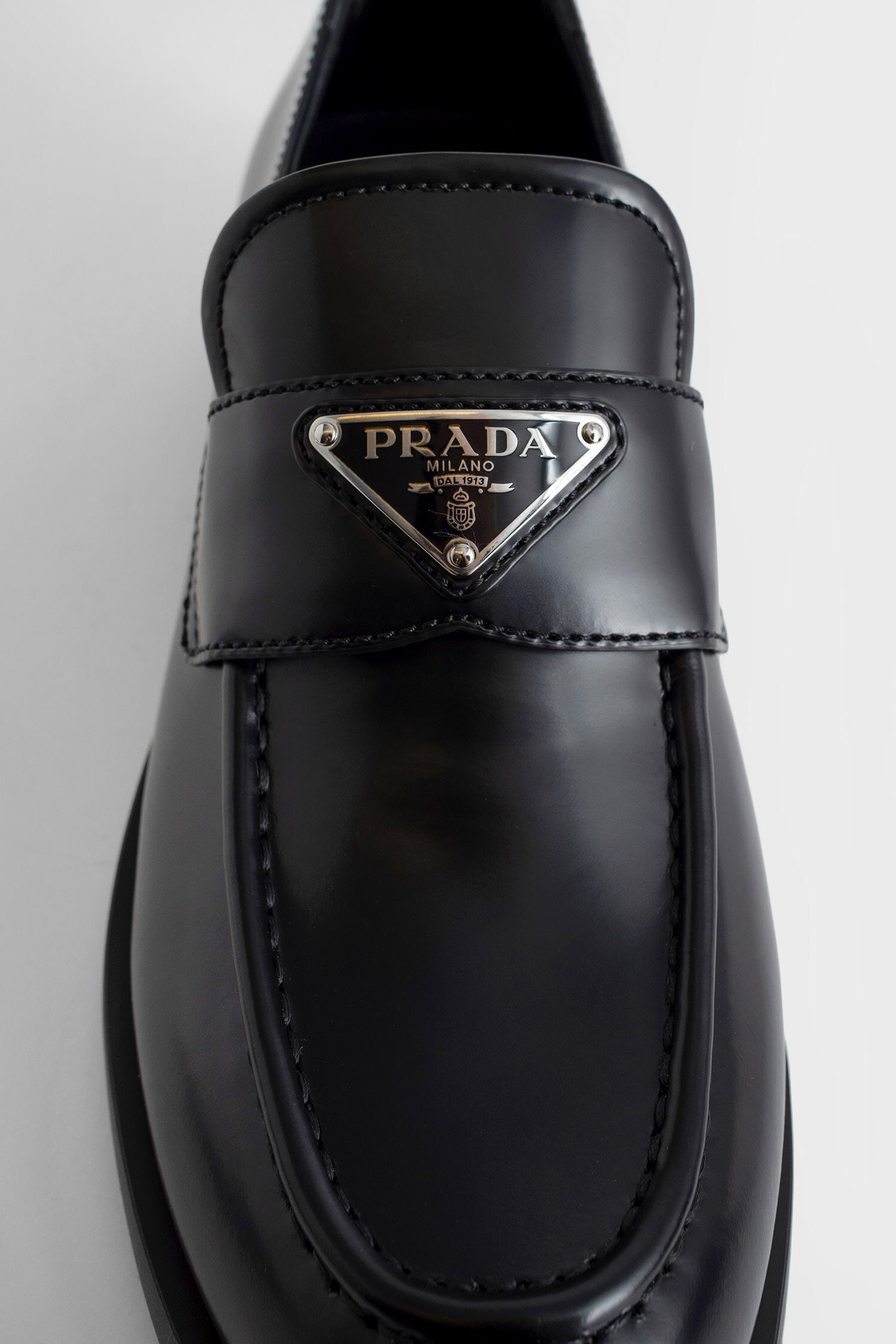 PRADA WOMAN BLACK LOAFERS