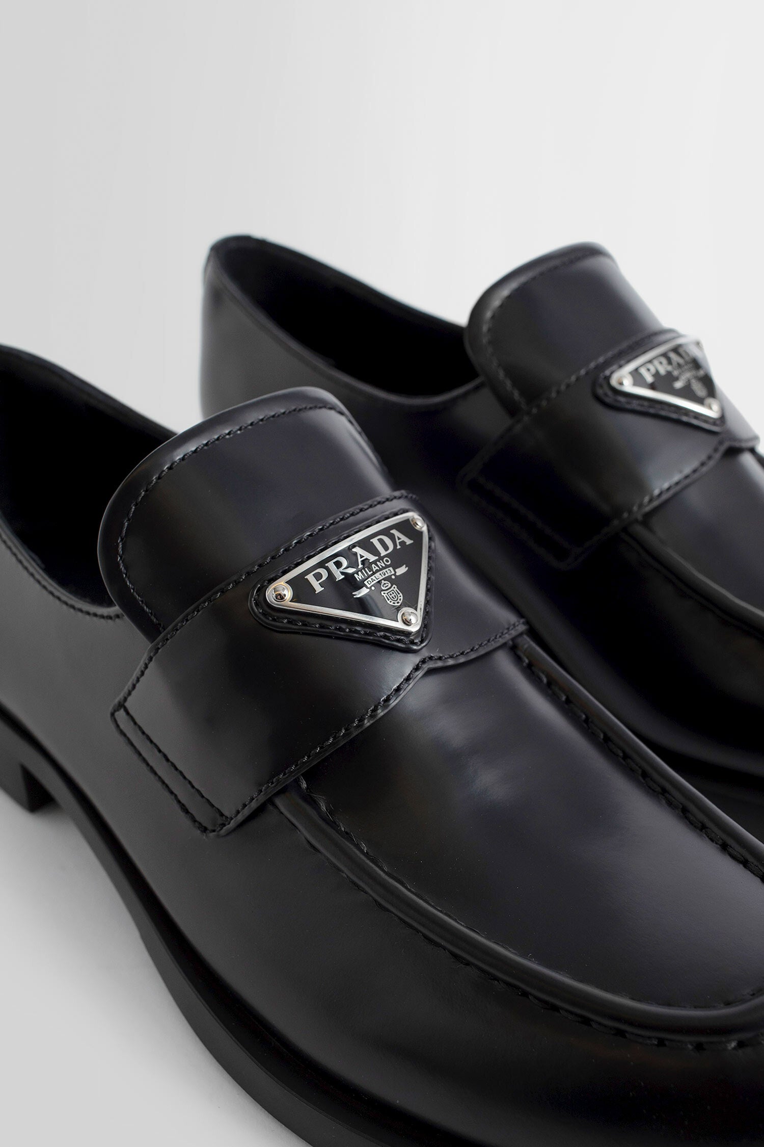 PRADA WOMAN BLACK LOAFERS & FLATS