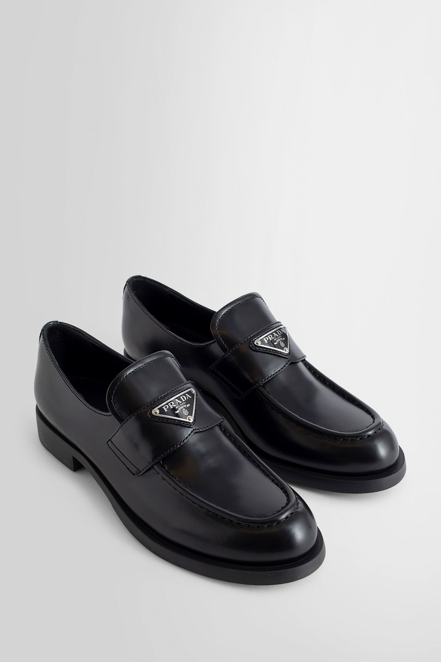 PRADA WOMAN BLACK LOAFERS & FLATS