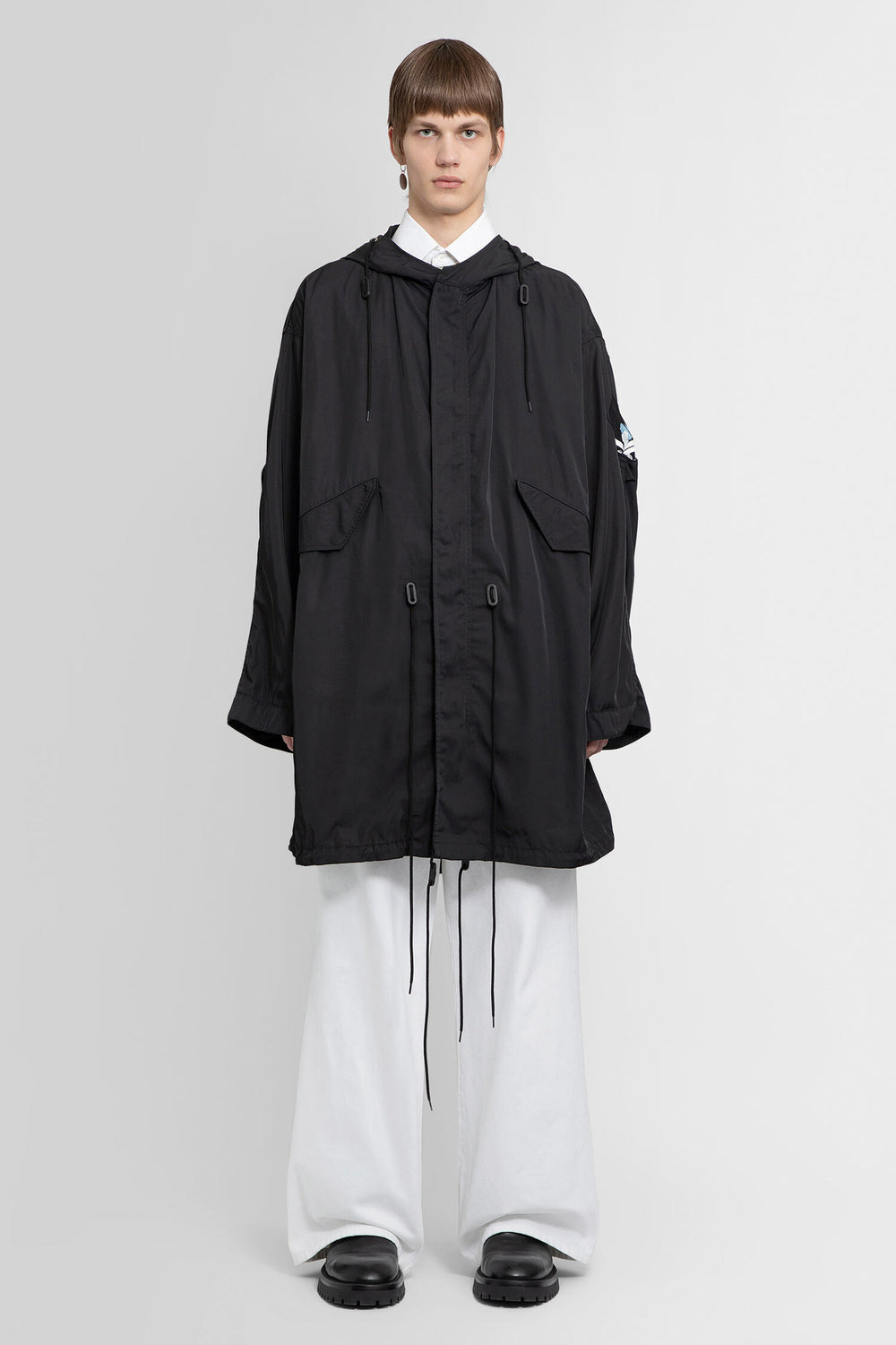 RAF SIMONS MAN BLACK COATS