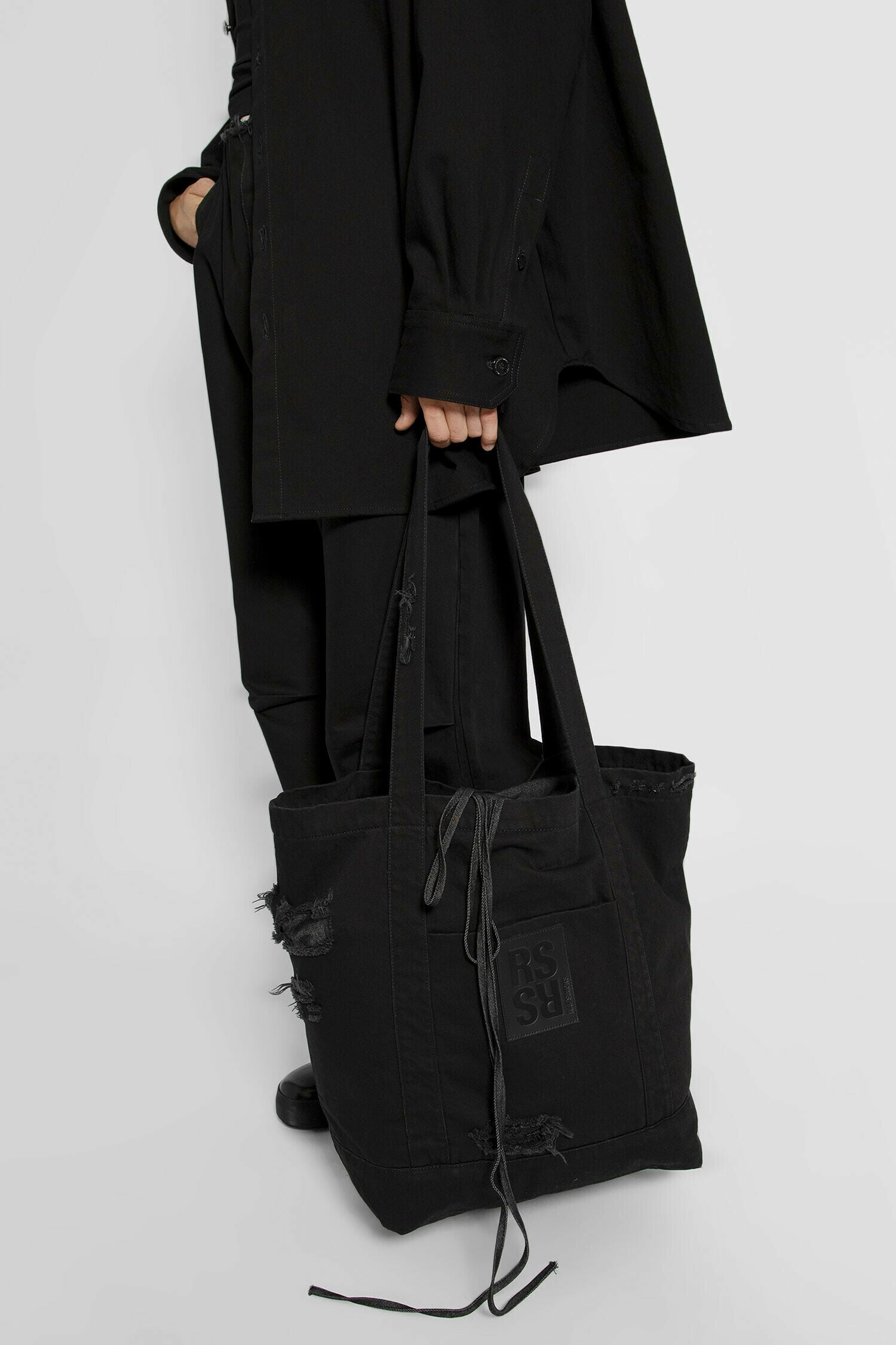 RAF SIMONS MAN BLACK TOTE BAGS