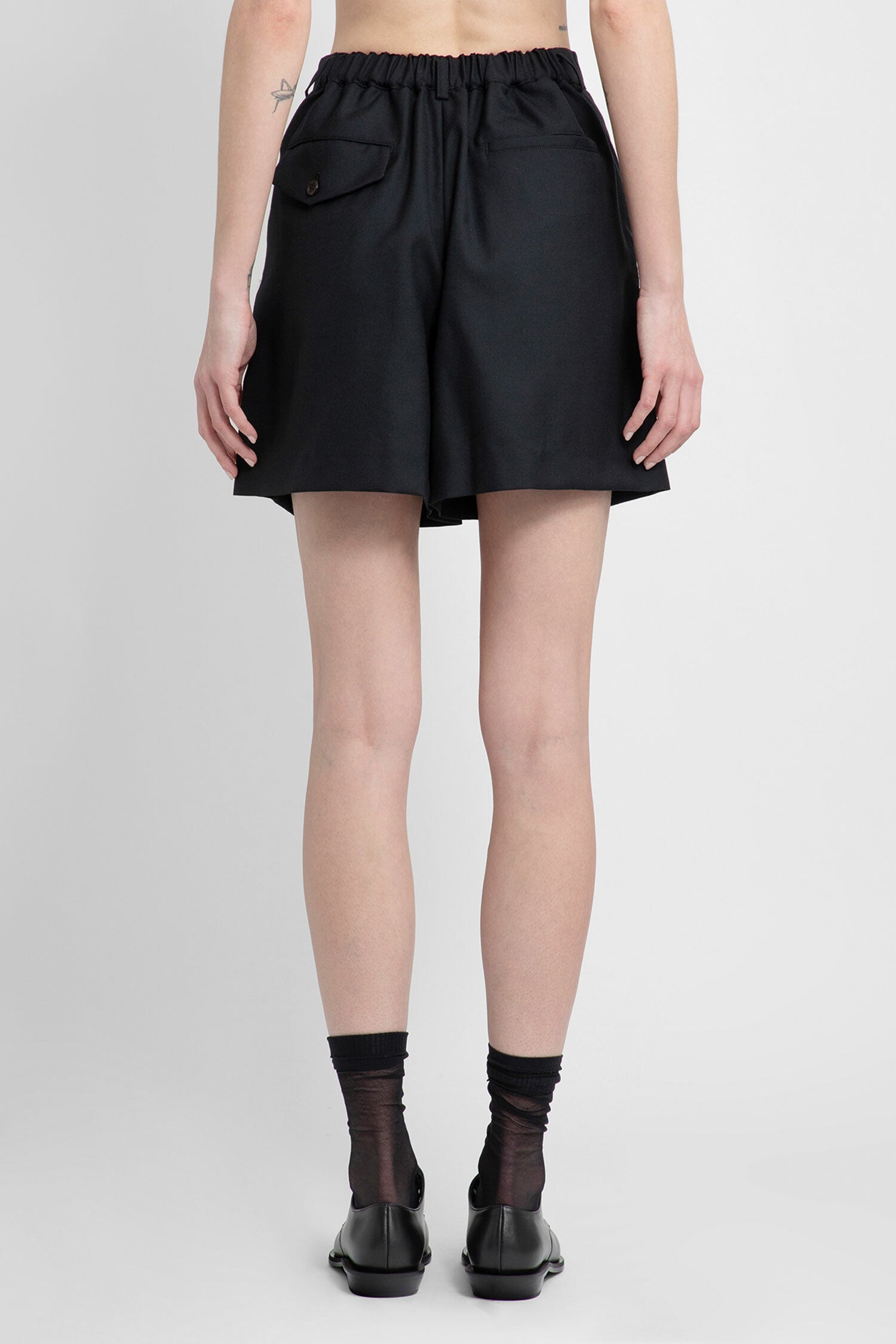 NOIR KEI NINOMIYA WOMAN BLACK SHORTS