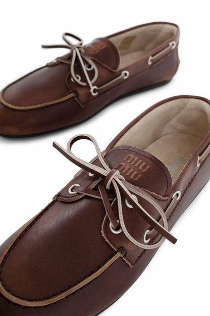 MIU MIU WOMAN BROWN FLATS - Antonioli.eu