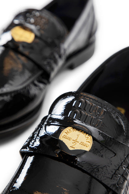 MIU MIU WOMAN BLACK FLATS