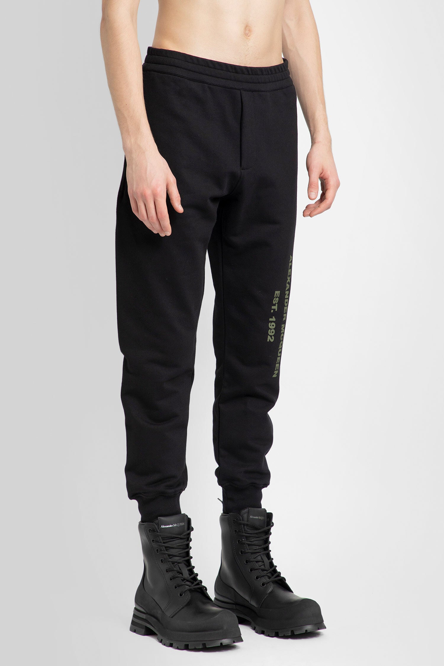 ALEXANDER MCQUEEN MAN BLACK TROUSERS