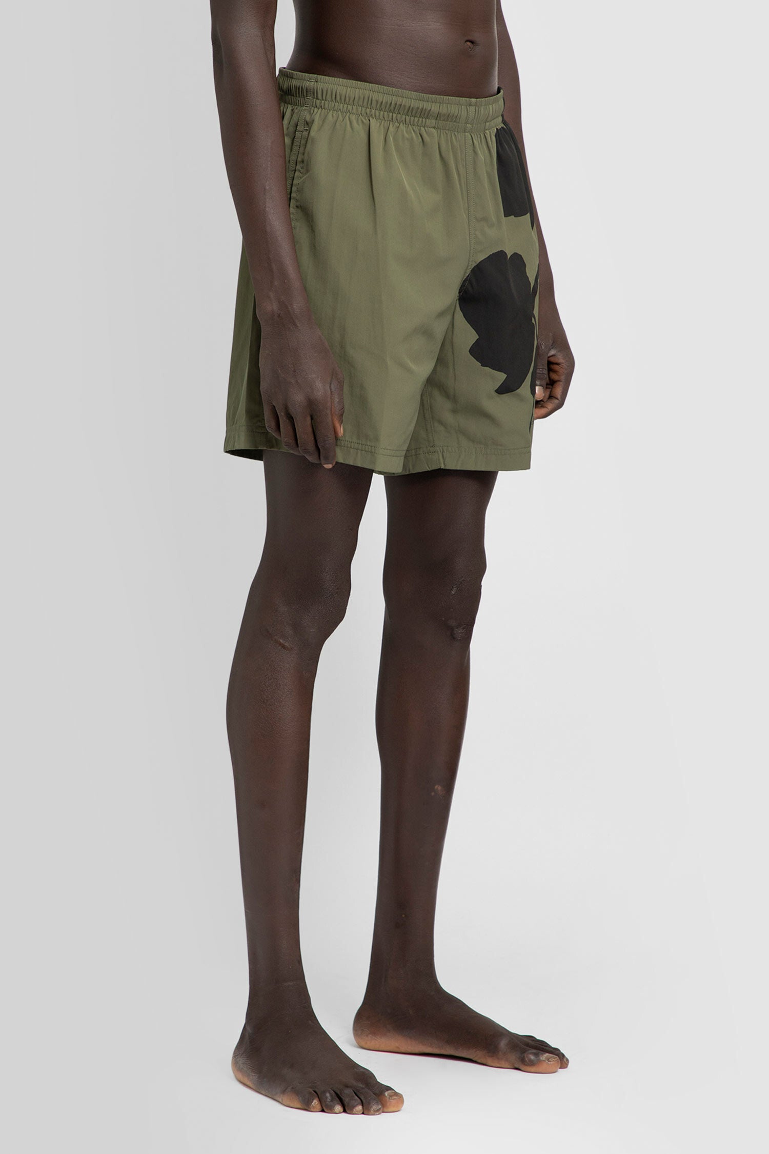 ALEXANDER MCQUEEN MAN GREEN SWIMWEAR