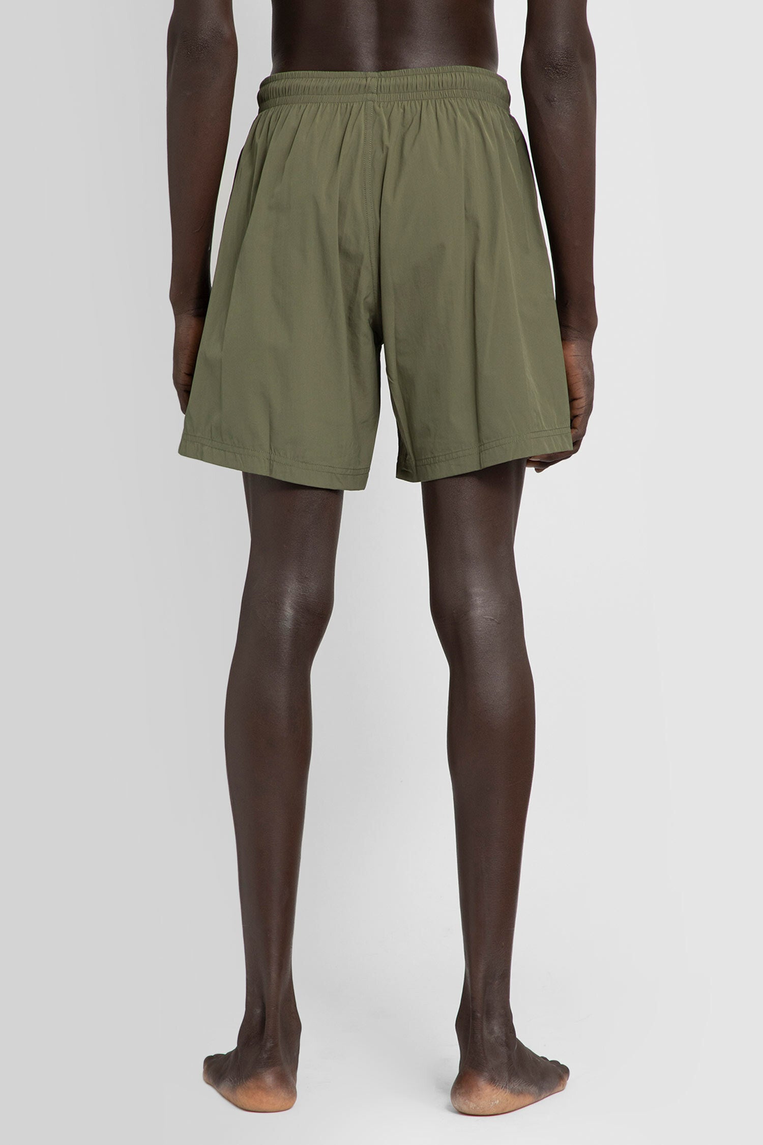 ALEXANDER MCQUEEN MAN GREEN SWIMWEAR