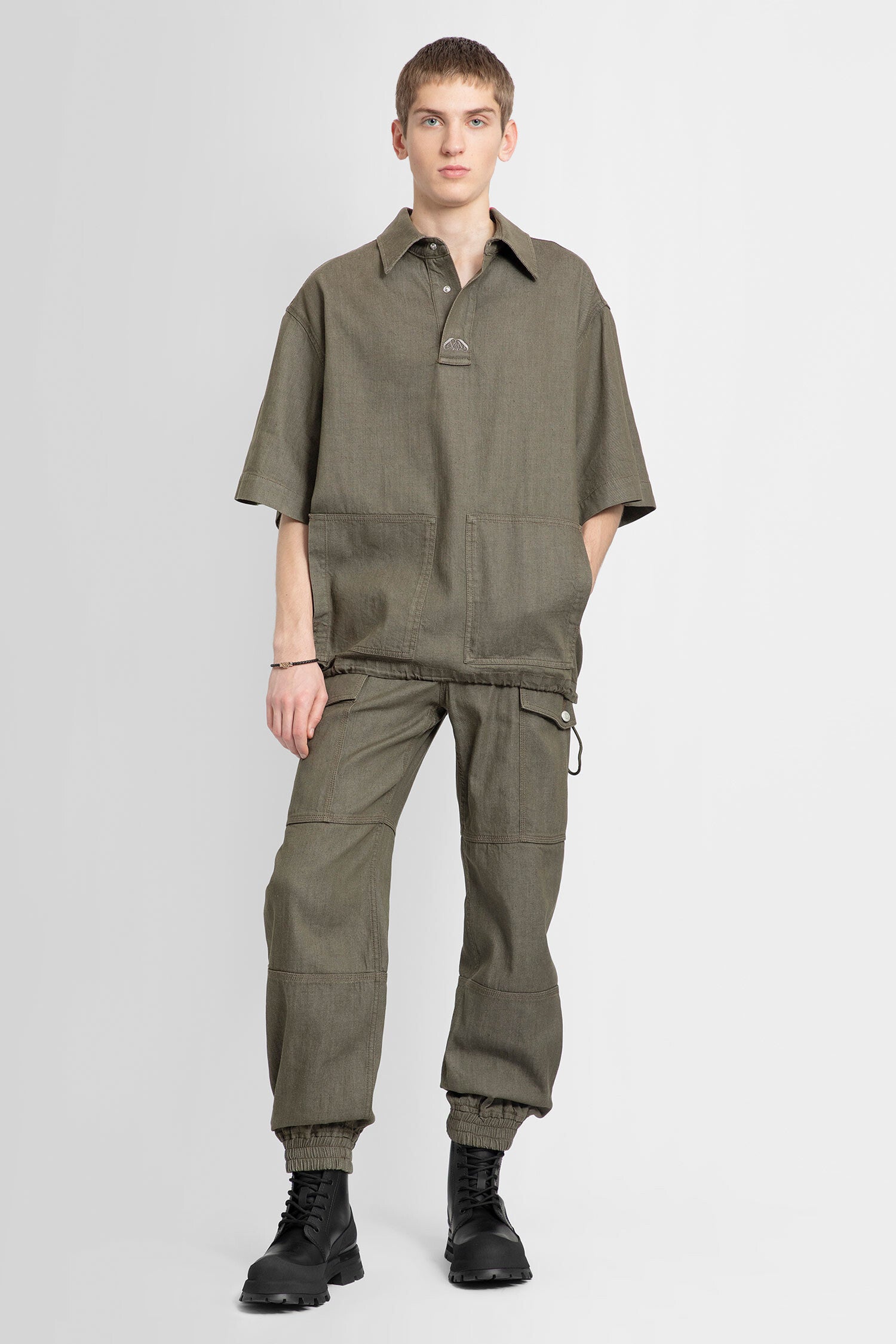 ALEXANDER MCQUEEN MAN GREEN TROUSERS