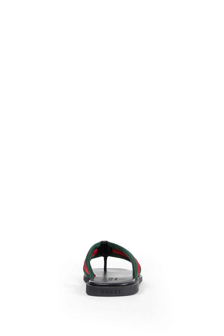 
              GUCCI Thong Sandal With Interlocking G man
            