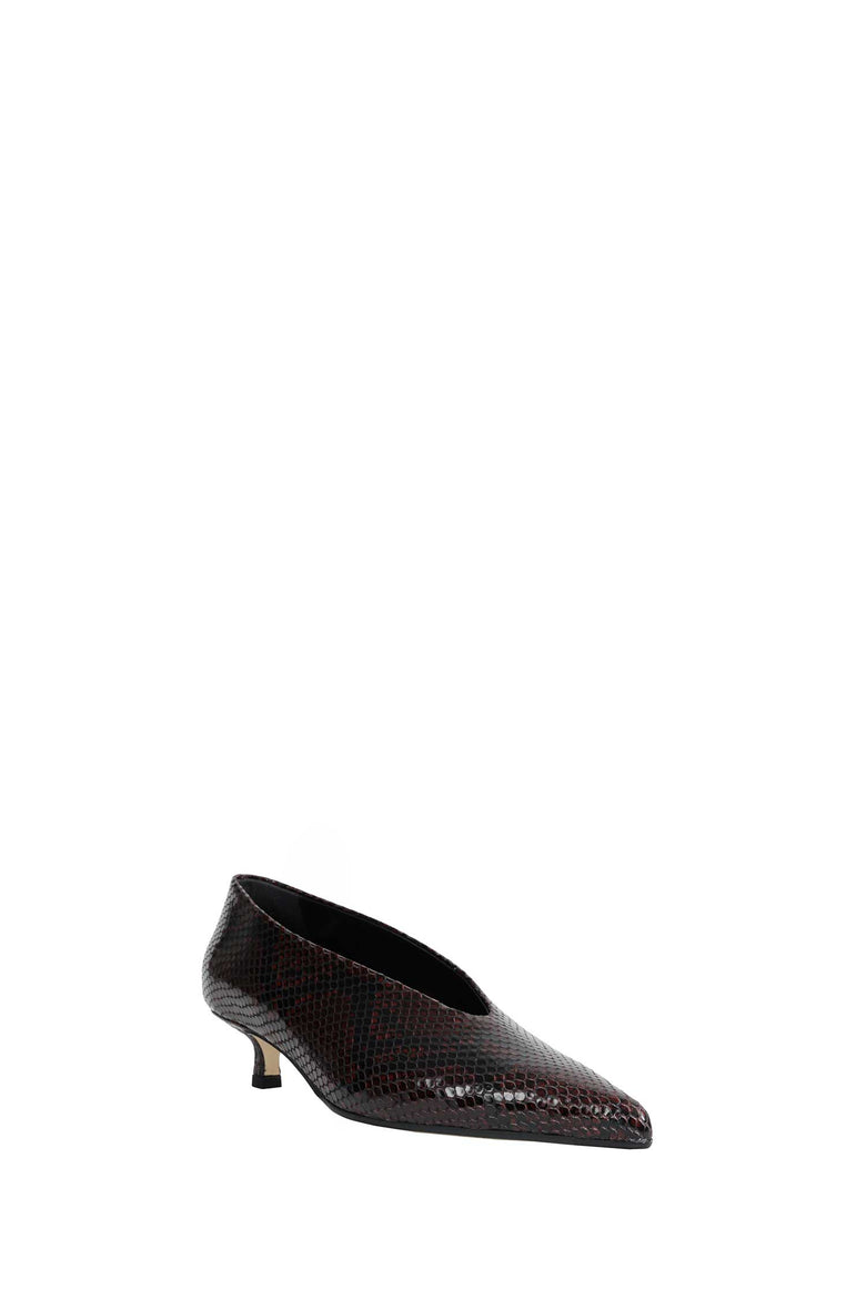 
              AEYDE Clara Pointed-Toe Pumps woman
            
