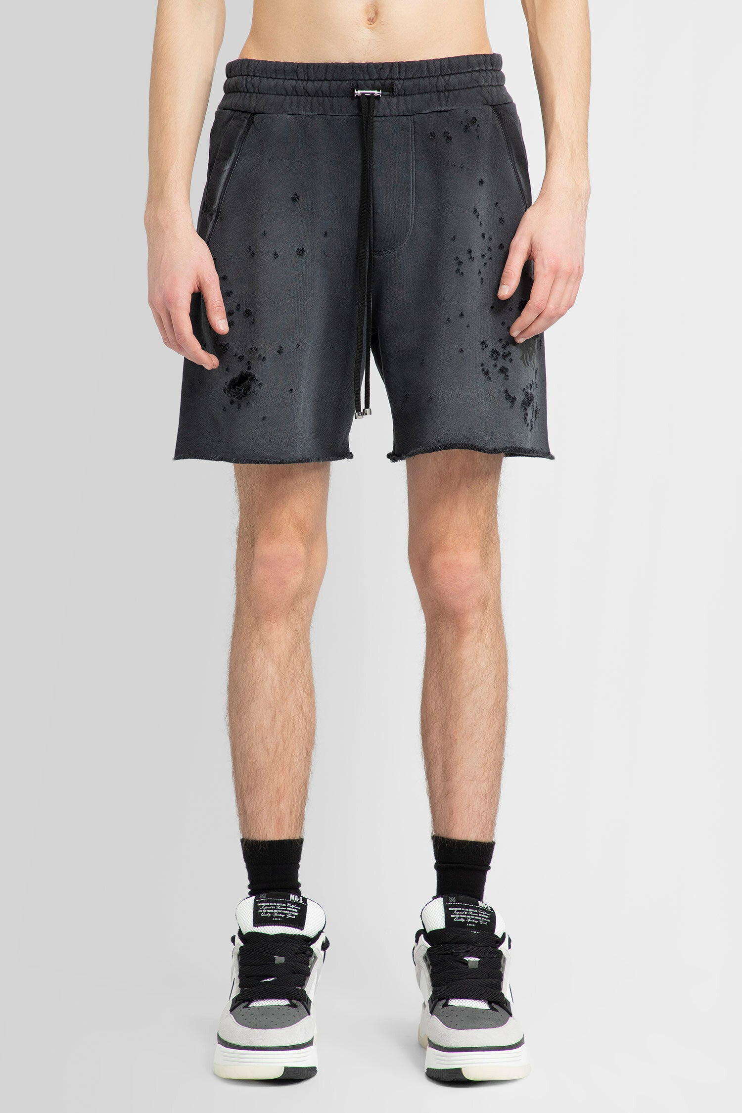 AMIRI MAN GREY SHORTS & SKIRTS