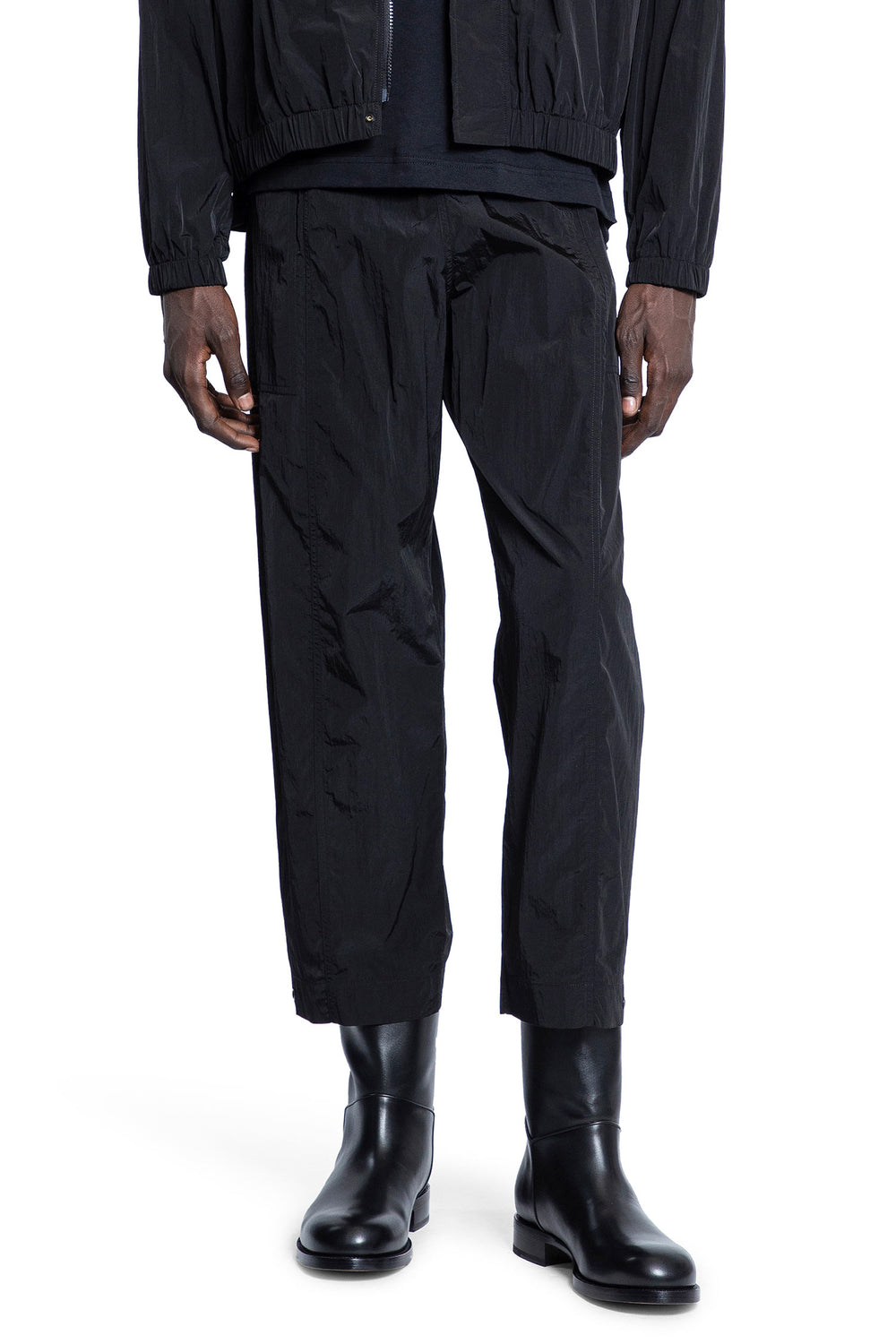 STUDIO NICHOLSON MAN BLACK TROUSERS