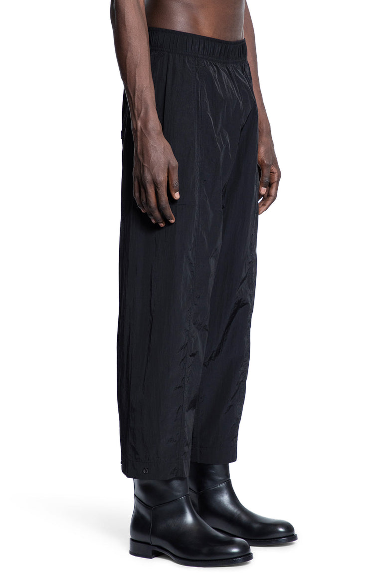 STUDIO NICHOLSON MAN BLACK TROUSERS