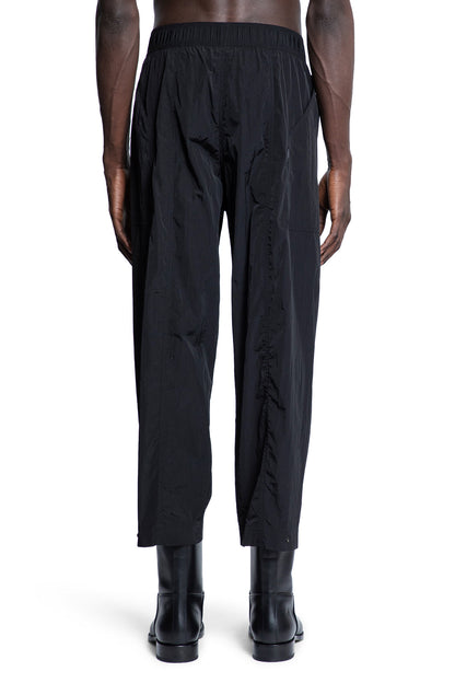 STUDIO NICHOLSON MAN BLACK TROUSERS