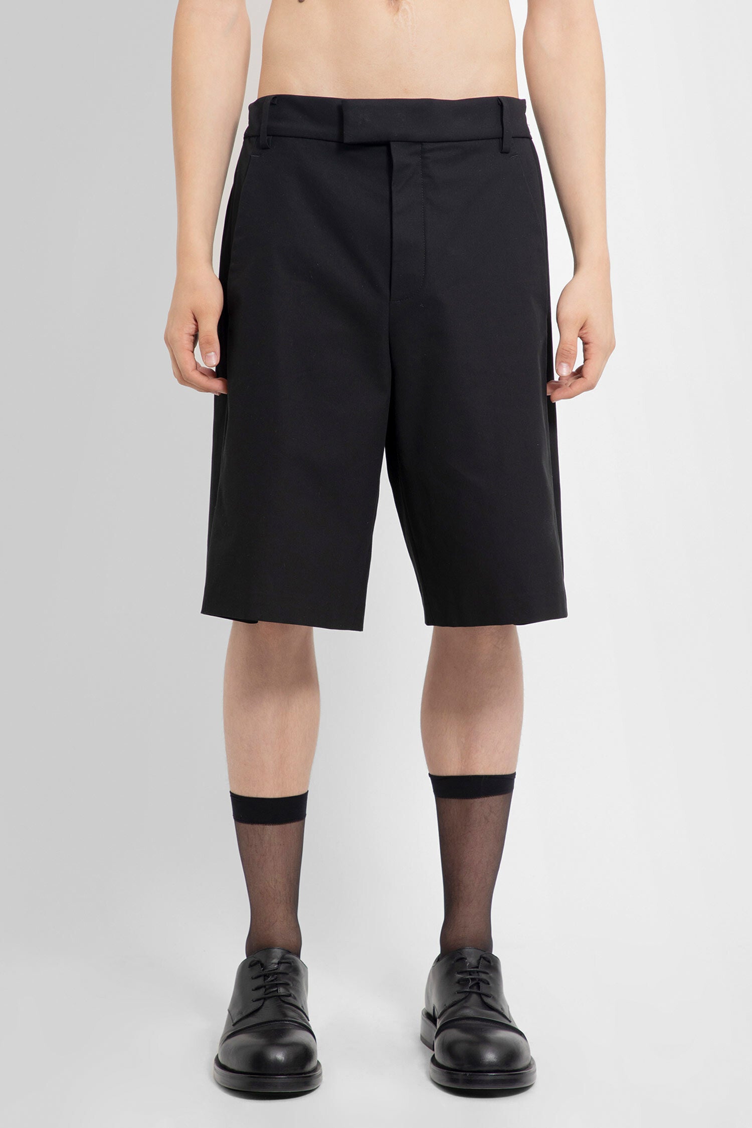 ANN DEMEULEMEESTER MAN BLACK SHORTS & SKIRTS