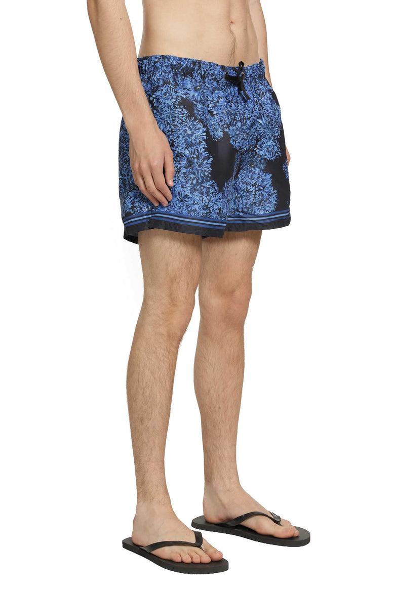 
              GIVENCHY Swim shorts with Pompom print man
            