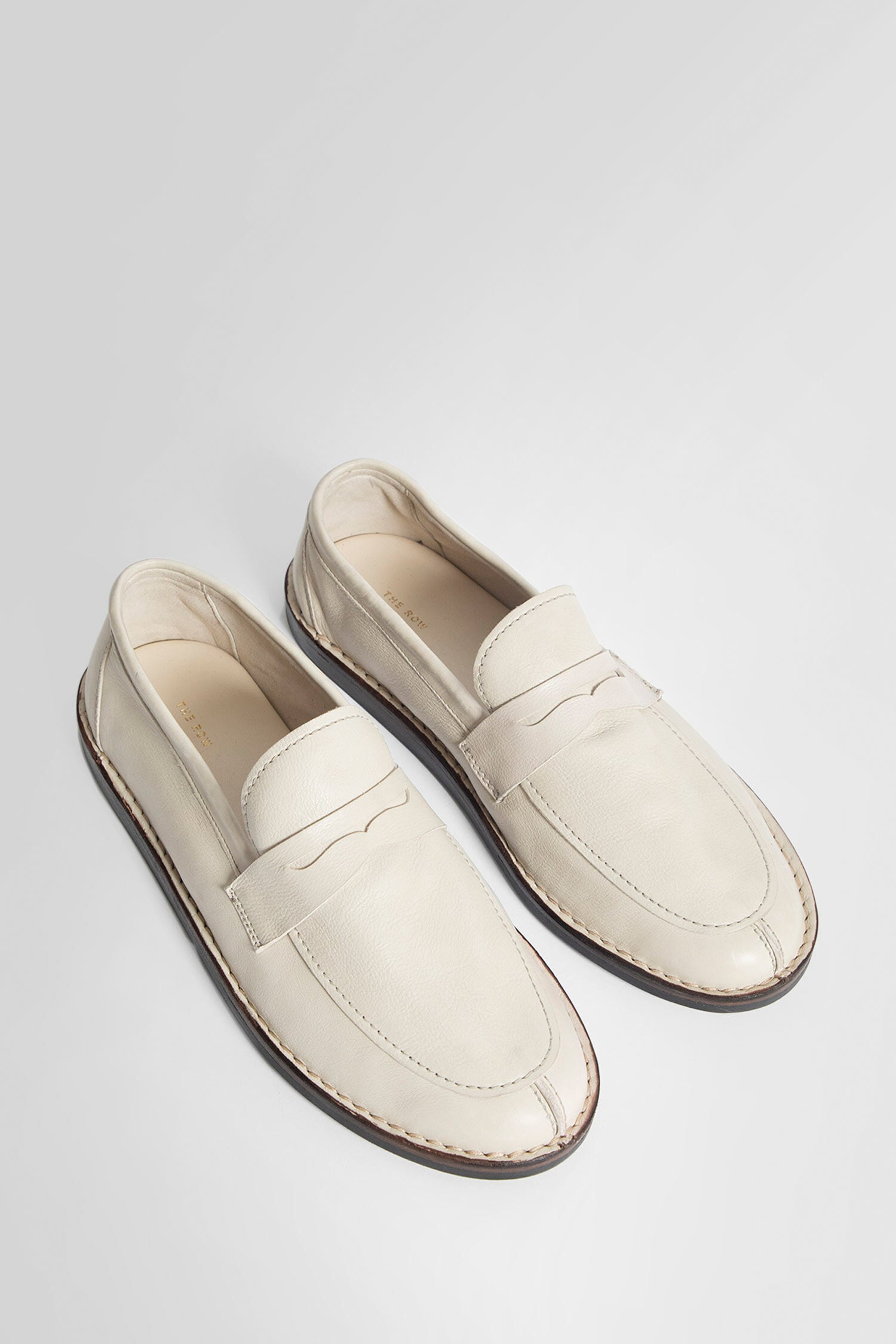 THE ROW WOMAN OFF-WHITE LOAFERS