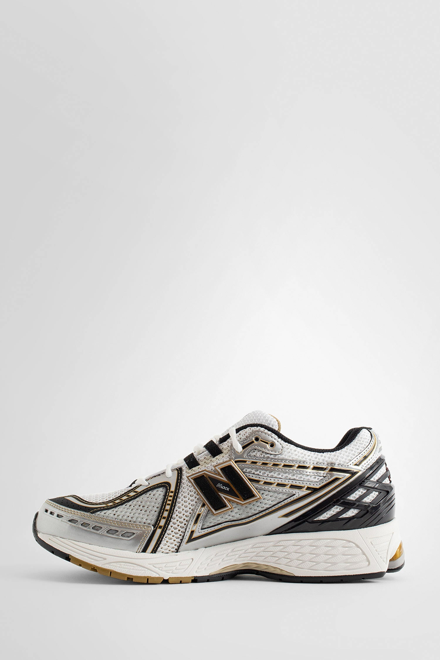 NEW BALANCE UNISEX SILVER SNEAKERS