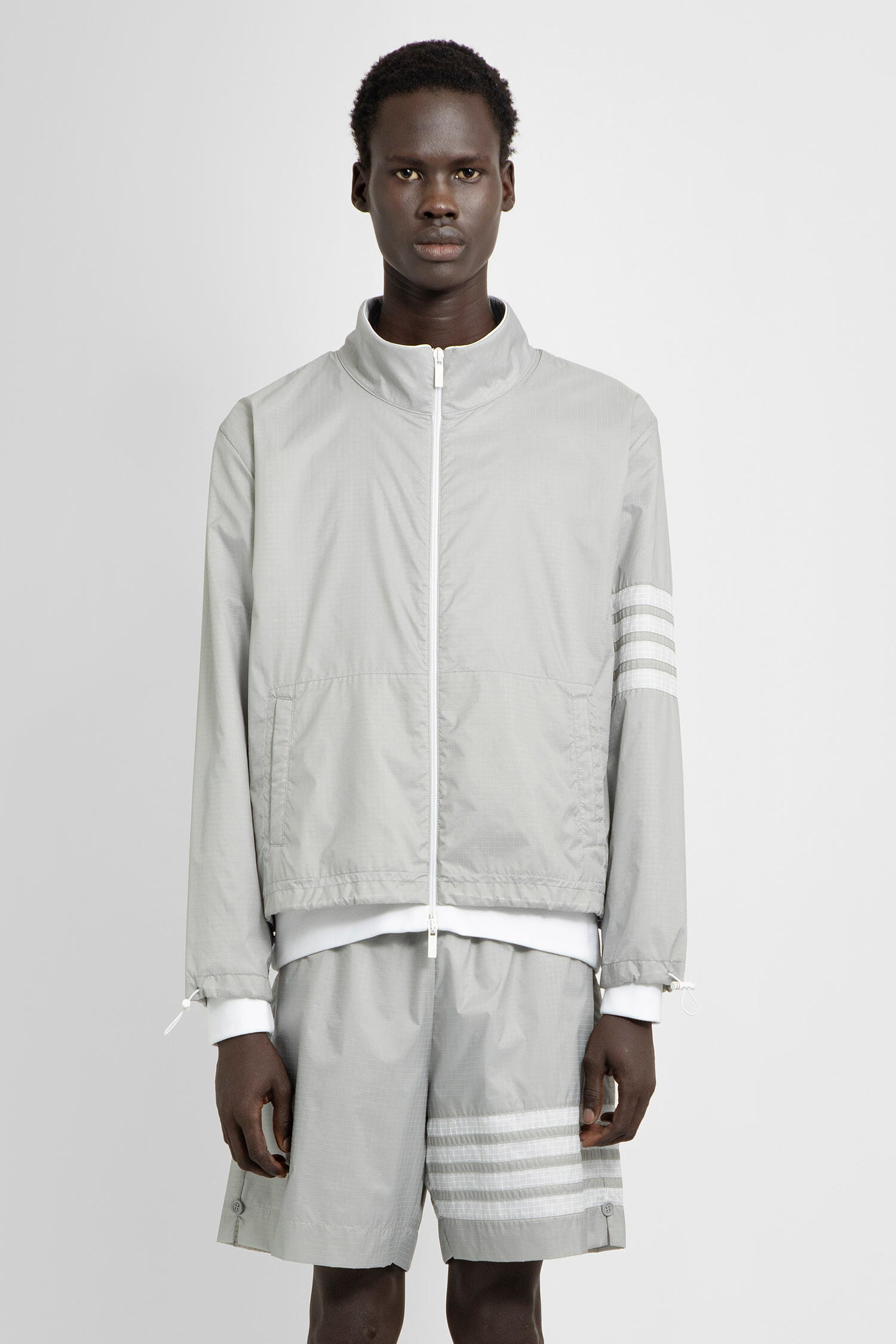 THOM BROWNE MAN GREY JACKETS