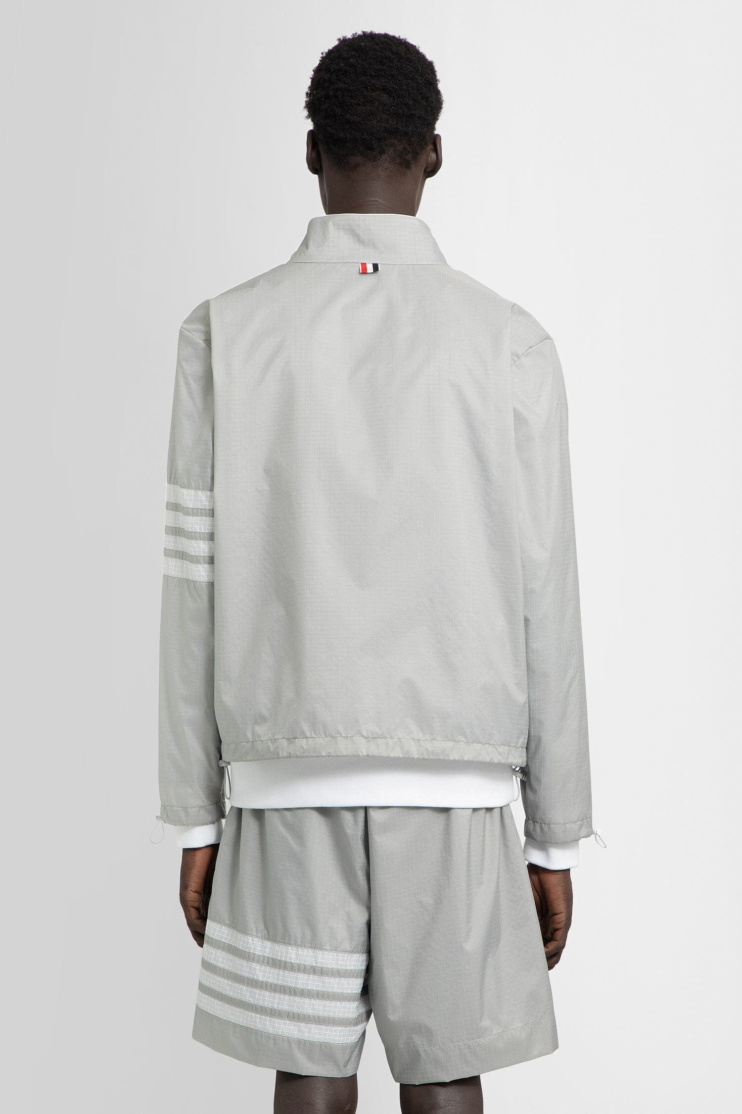 THOM BROWNE MAN GREY JACKETS