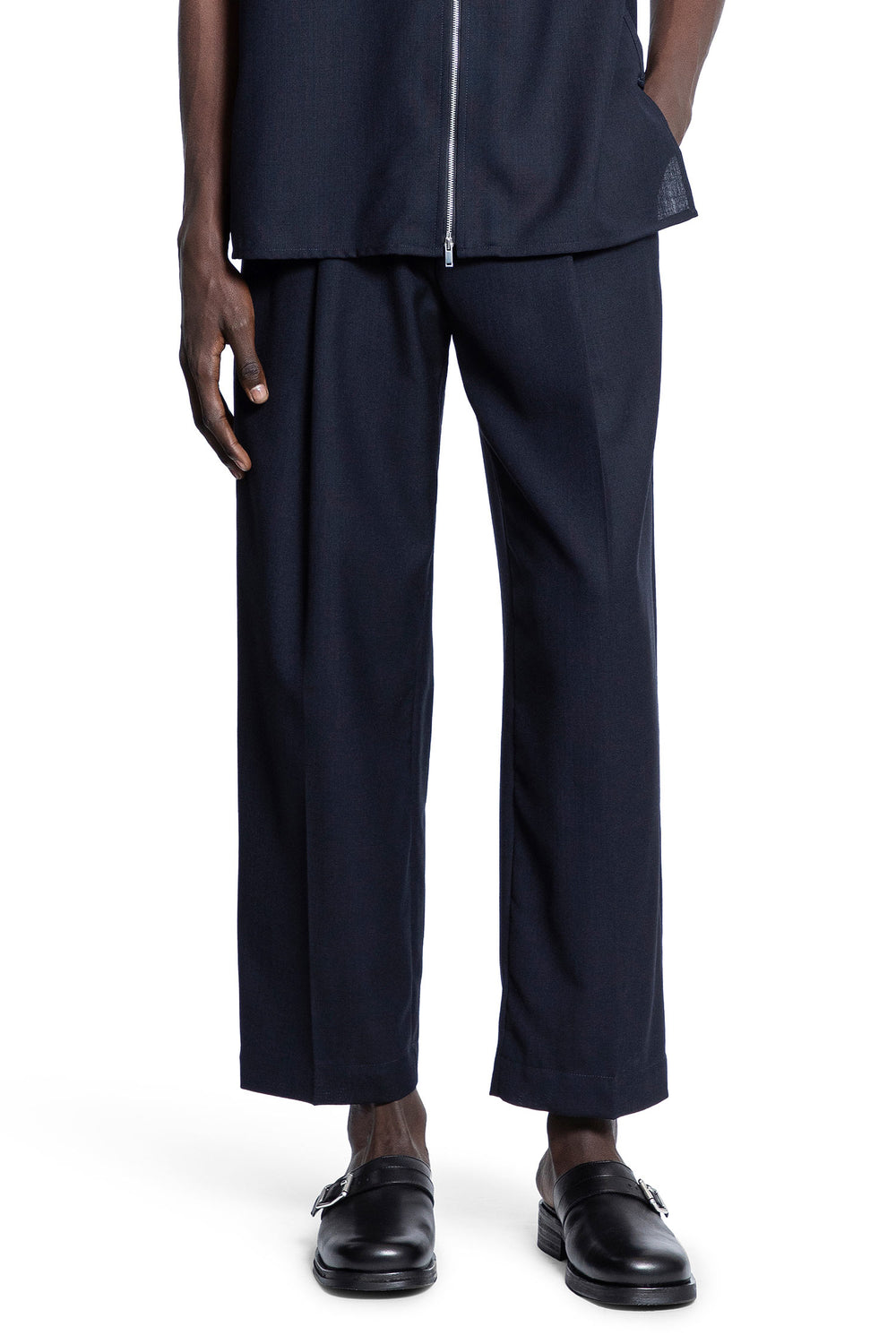 STUDIO NICHOLSON MAN BLUE TROUSERS