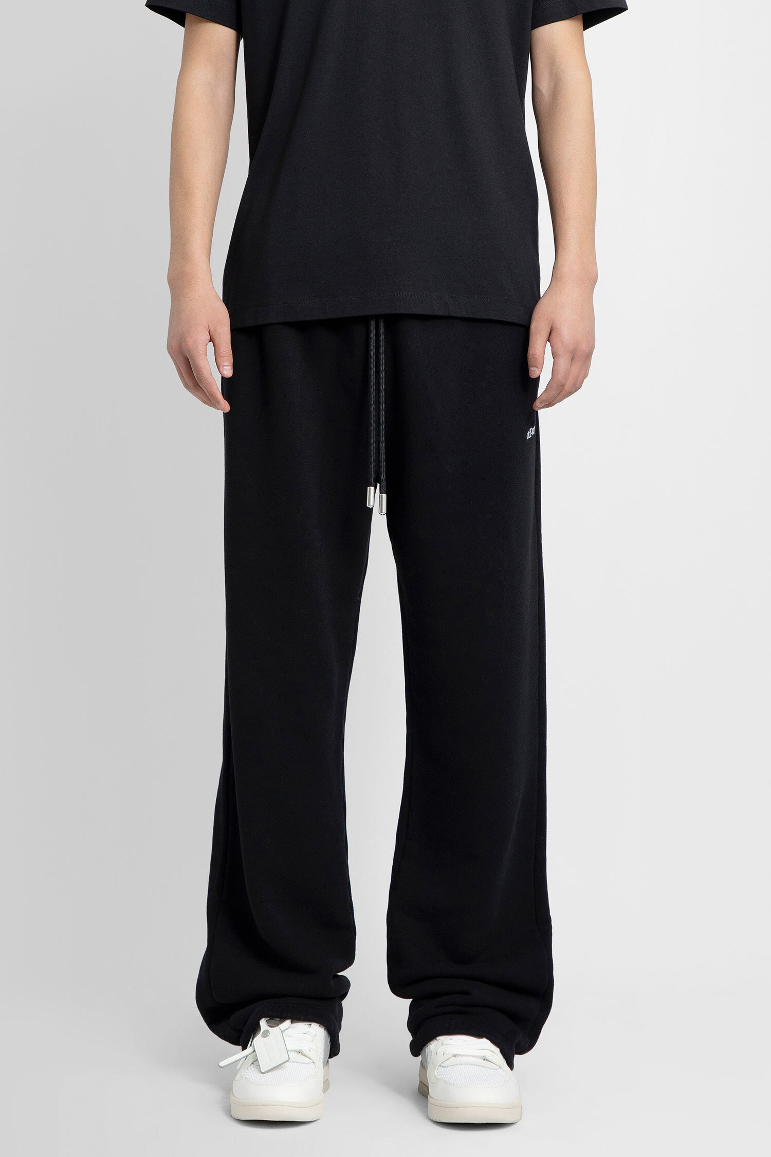 OFF-WHITE MAN BLACK TROUSERS