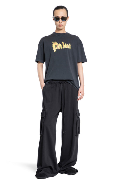 PALM ANGELS MAN BLACK TROUSERS