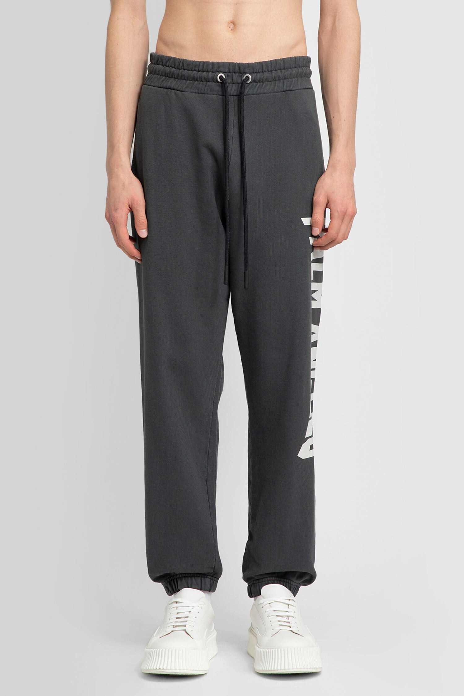 PALM ANGELS MAN GREY TROUSERS