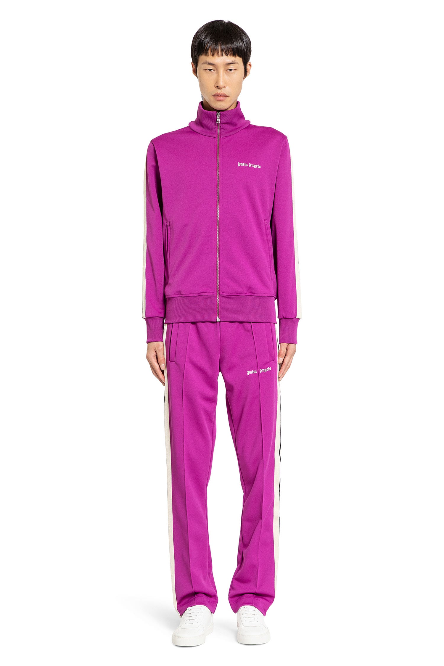 PALM ANGELS MAN PURPLE TROUSERS