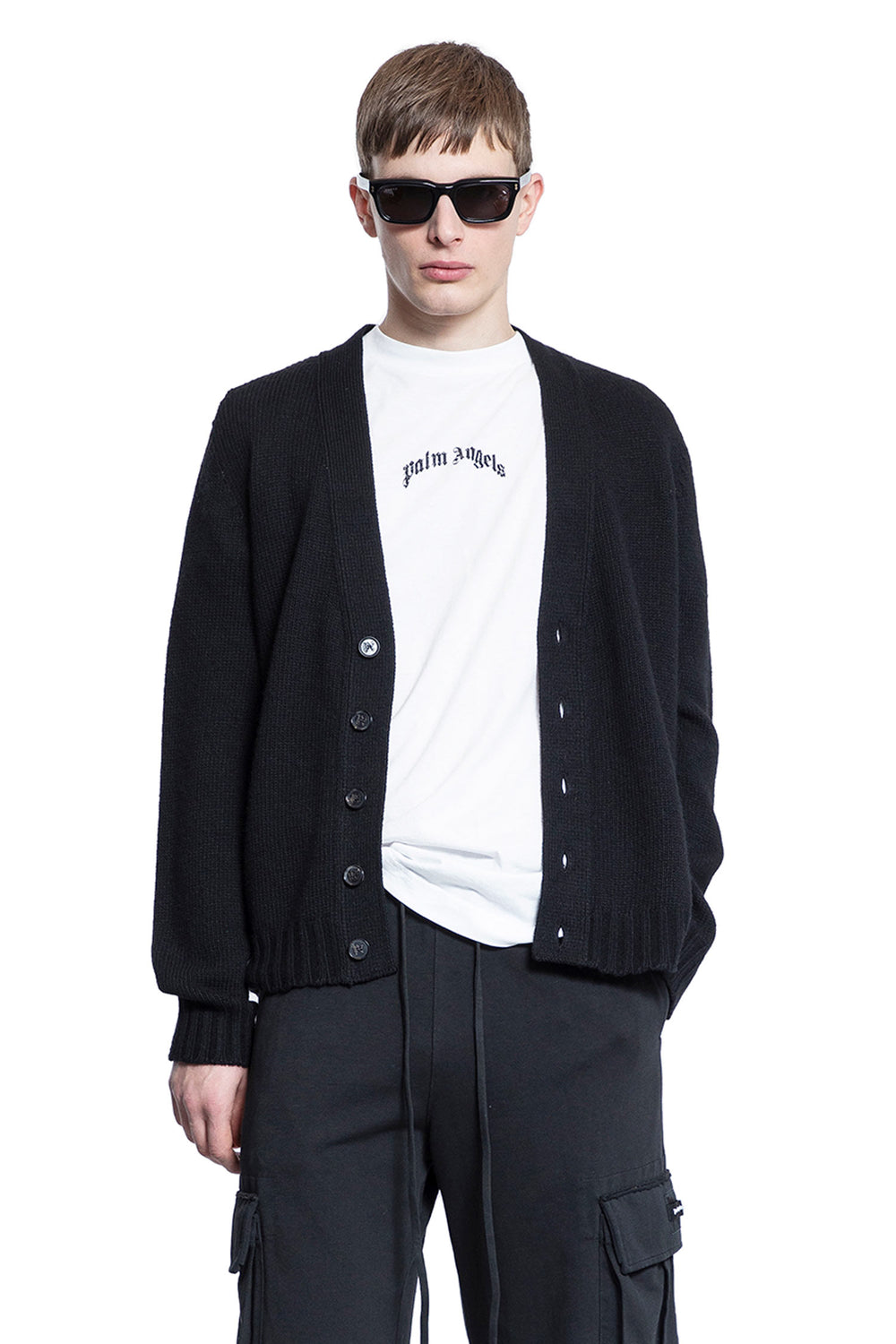 PALM ANGELS MAN BLACK KNITWEAR