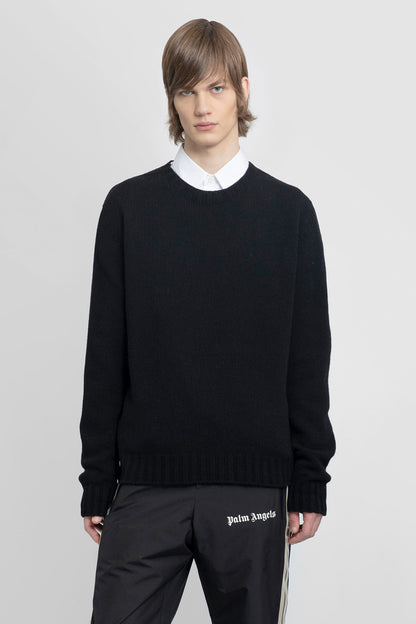 PALM ANGELS MAN BLACK KNITWEAR