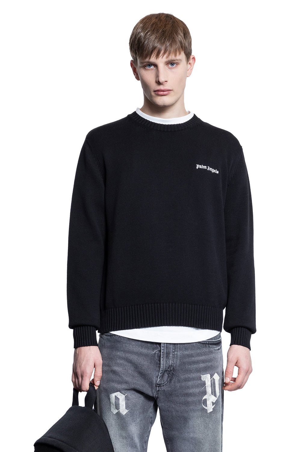 PALM ANGELS MAN BLACK KNITWEAR