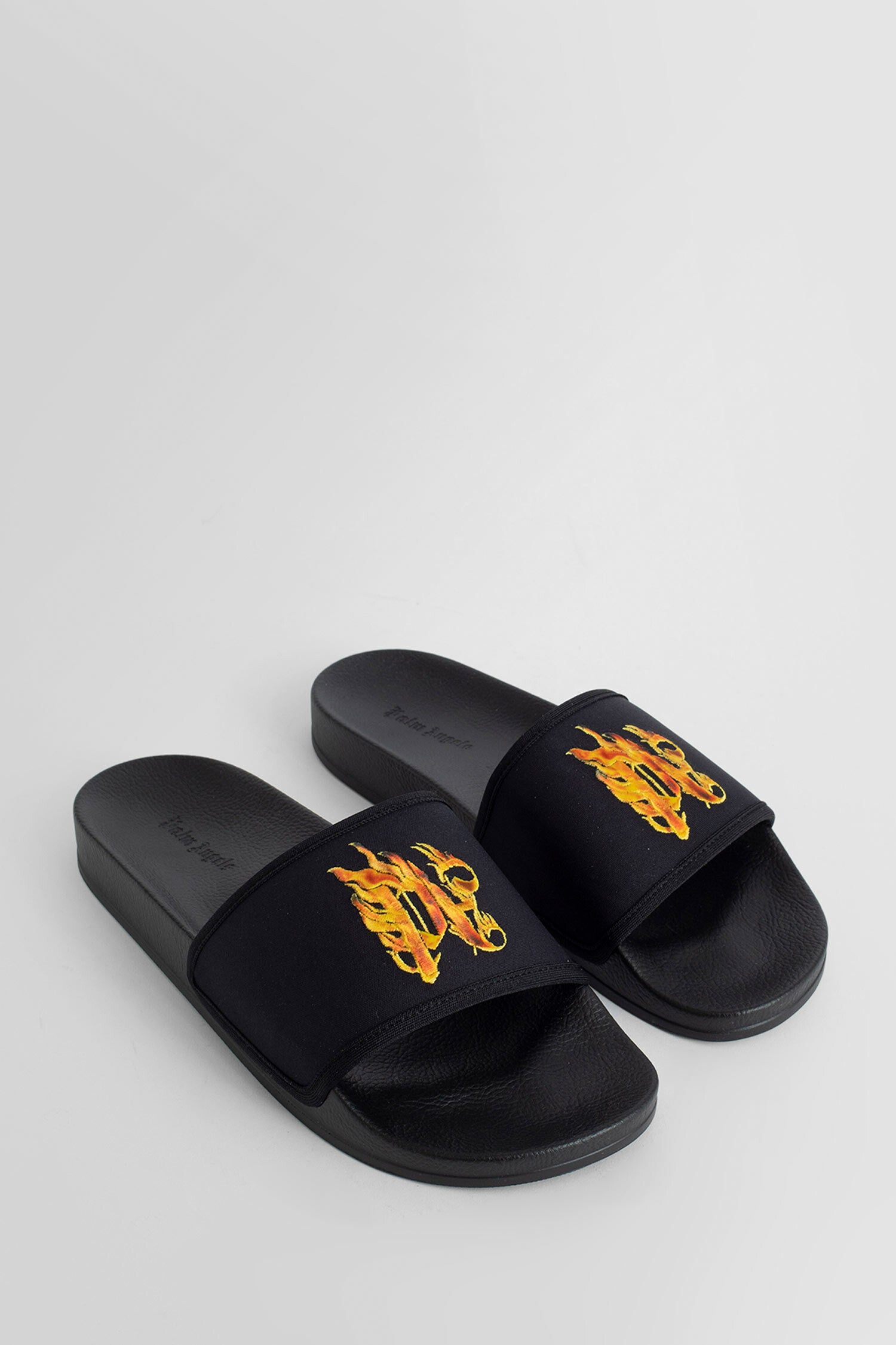 PALM ANGELS MAN BLACK SANDALS & SLIDES