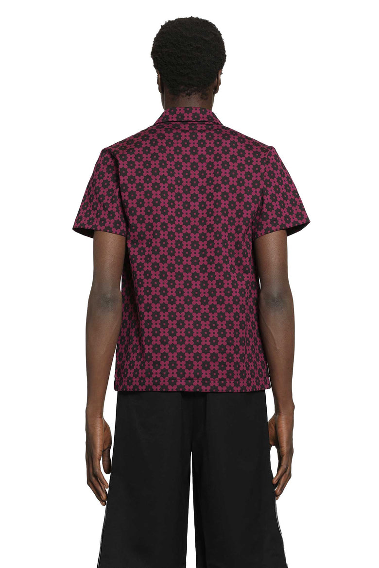 
              COMME DES GARCONS HOMME PLUS Floral Graphic Print Polo Shirt man
            