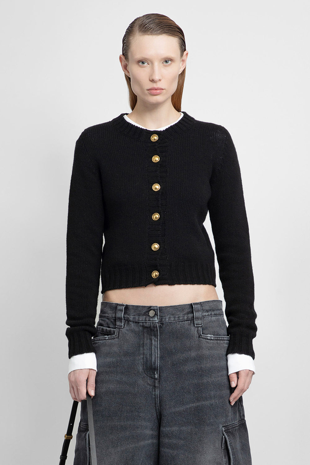 PALM ANGELS WOMAN BLACK KNITWEAR