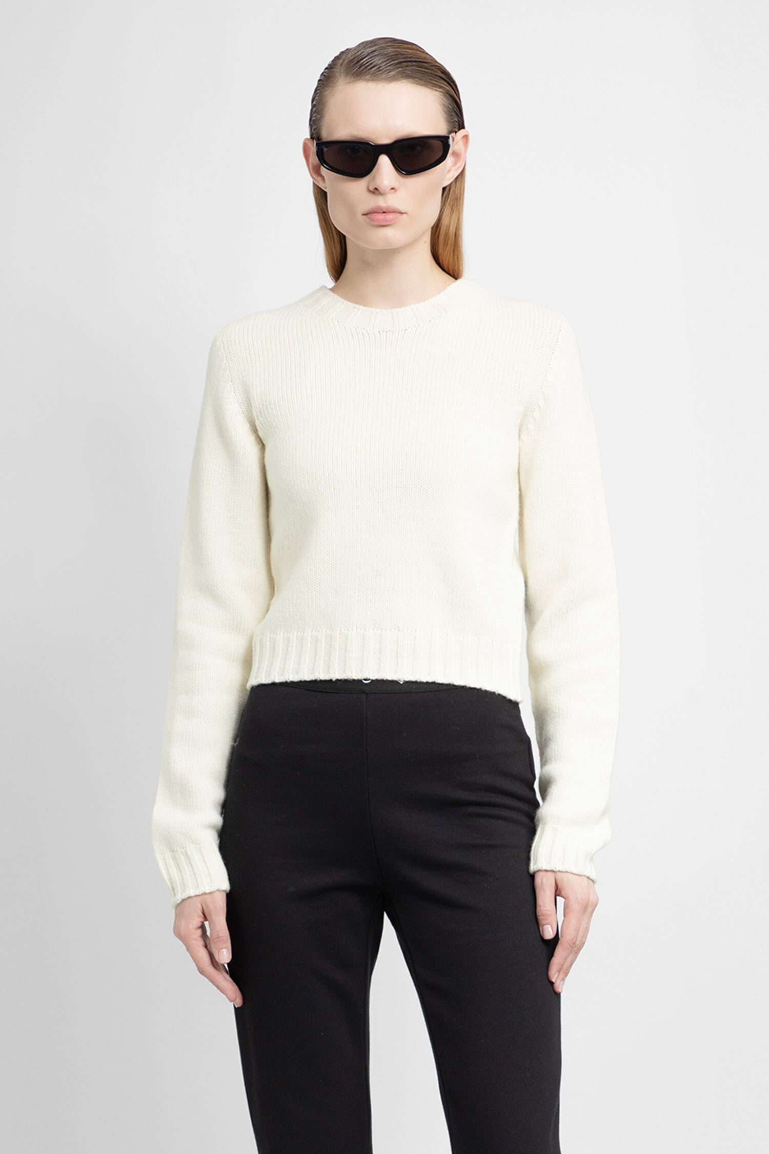 PALM ANGELS WOMAN OFF-WHITE KNITWEAR