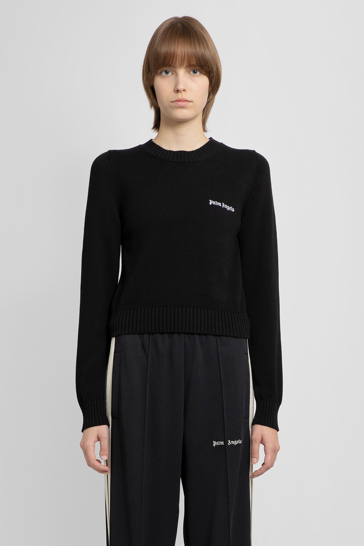 PALM ANGELS WOMAN BLACK KNITWEAR