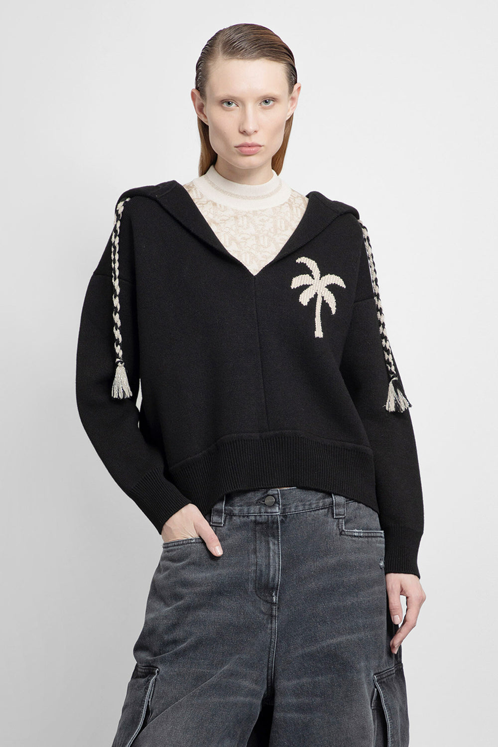 PALM ANGELS WOMAN BLACK KNITWEAR