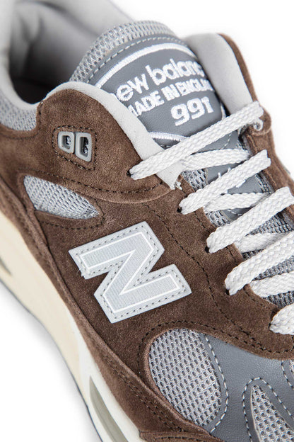 NEW BALANCE UNISEX BROWN SNEAKERS