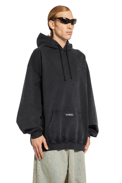 VETEMENTS MAN BLACK SWEATSHIRTS