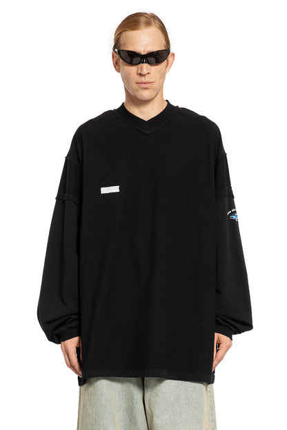 VETEMENTS MAN BLACK T-SHIRTS & TANK TOPS