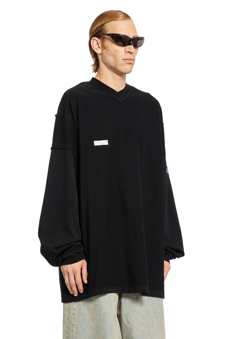 VETEMENTS MAN BLACK T-SHIRTS & TANK TOPS